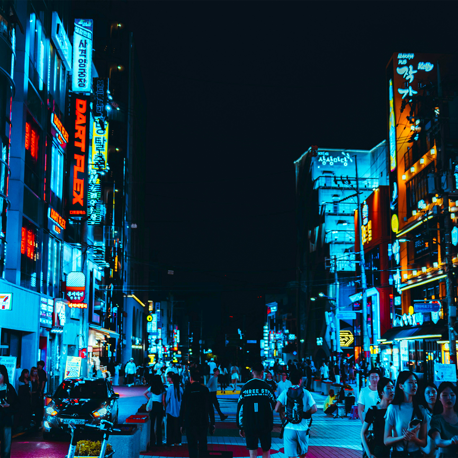 Hongdae's night streets in Seoul, South Korea, with their dazzling neon signs and billboards, are eye-catching.